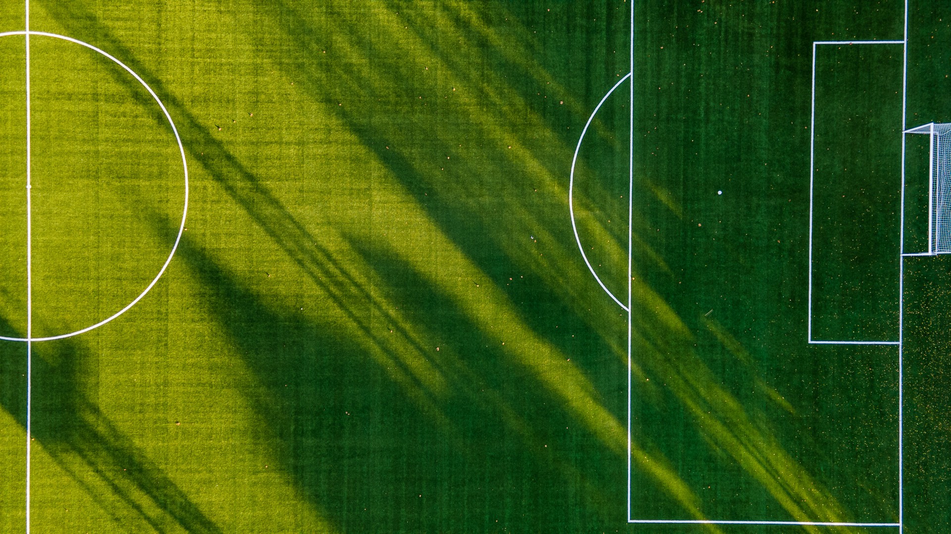 Empty Green soccer football pitch Aerial View